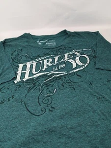 Hurley & Buckle Collab Herren Grafikdruck T-Shirt X-Large grün/weiß - Bild 1 von 6
