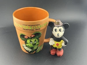 VINTAGE MICKEY MOUSE FIGUR UND 2013 EPCOT CENTER FLOWER AND GARDEN FESTIVAL TASSE - Bild 1 von 5