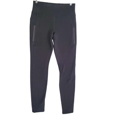 Leggings Athleta para mujer medianos negros tiro alto bolsillos con cremallera atléticos correr Foto 1 de 4