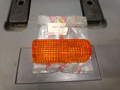 TOYOTA CELICA TA40 RA40 77-79 FRONT LEFT TURN SIGNAL LIGHT LAMP LENS NEW GENUINE - Image 1 of 4