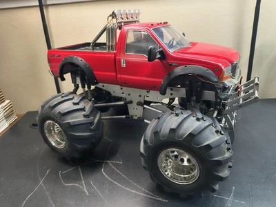 Monster Truck Tamiya Juggernaut 2 estantes Queen raro mejorado ARTR 4x4x4 de colección Foto 1 de 4