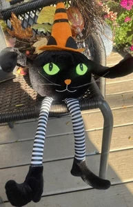 Halloween Gato Negro Sentado Estante Cuidador Cuelga Piernas Decoración Bruja Sombrero Brazos Flexibles - Imagen 1 de 2