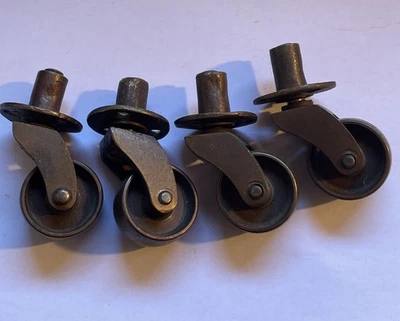Ruedas antiguas de hierro fundido muebles ruedas de latón Foto 1 de 4