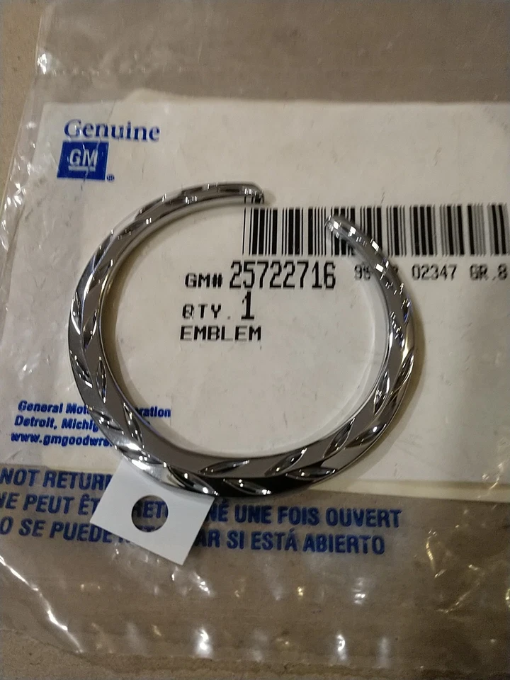 New OEM GM Cadillac DeVille Seville ElDorado Wreath Emblem 2002-05 25722716 - Image 1 of 1