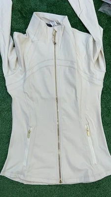Chaqueta para mujer Lululemon Define Nulu Sonic blanca con cremallera dorada talla 6 Foto 1 de 2