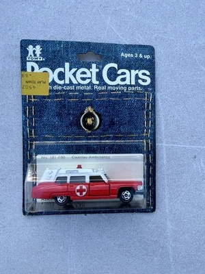 Coches de bolsillo Tomy vintage n.º Ambulancia Cadillac 181-F60 en coche tarjeta RARO Foto 1 de 4
