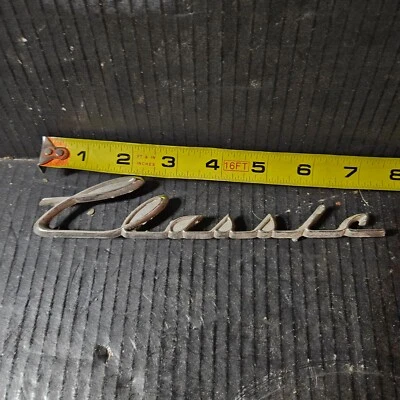 1961 62 63 64 AMC RAMBLER CLASSIC emblema insignia cuarto guardabarros trasero Foto 1 de 4