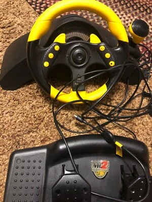 Mad Catz Universal MC2 (6320) Steering Wheel and Petal, Xbox, GameCube & PS2 - Image 1 of 3
