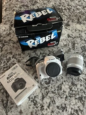 Canon EOS Rebel SL1 / EOS 100D 18.0MP Digital SLR Camera - White (Kit w/ EF-S IS - Image 1 of 3