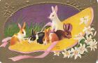 Carte postale de vœux de Pâques en relief Winsch lapins dans chapeau fleurs