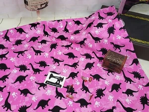 Pink Dinosaurs cotton elastane jersey knit fabric 150cm wide - Bild 1 von 3