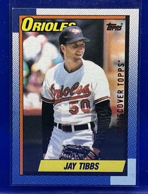 1990 Topps Jay Tibbs Baltimore Orioles #677 Buyback Rediscover Topps Stamp - Image 1 of 2
