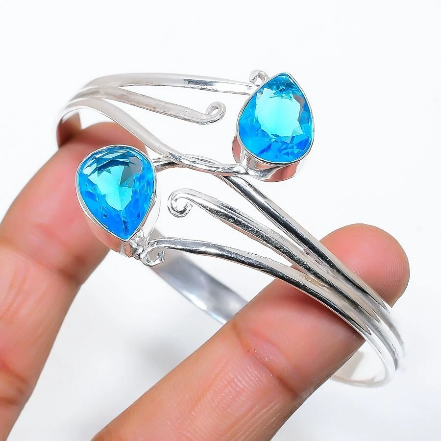 Brazalete ajustable de plata de ley 925 hecho a mano con piedras preciosas de topacio azul suizo Foto 1 de 1