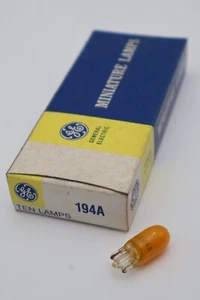 Caja de 10 bombillas automotrices ámbar vintage GE 194A miniatura - Imagen 1 de 2