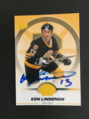 KEM LINSEMAN #6  AUTOGRAPHED 2023/24  U.D. BRUINS YELLOW CENTENNIAL CARD - Image 1 of 2