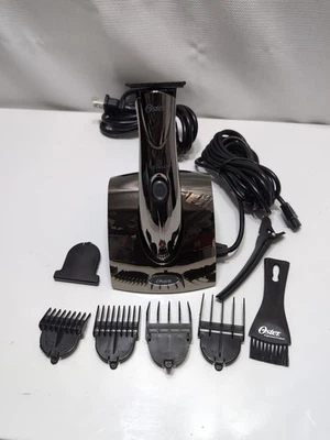 Recortadora de cuchillas en T inalámbrica Oster Artisan con cuchilla recubierta de titanio y soporte de carga+ Foto 1 de 4