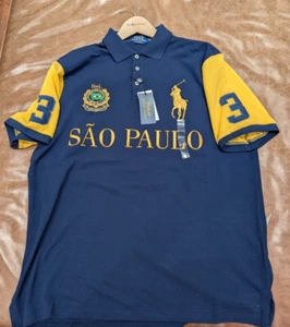 Neu mit Etikett Polo Ralph Lauren Poloshirt "Sau Paulo" in Blau & Gelb - Bild 1 von 4