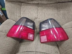 Used Pair of Saab 9000  Sedan Griffin Trunk Tail Light Lens Fits  1988 to 1992 - Picture 1 of 5
