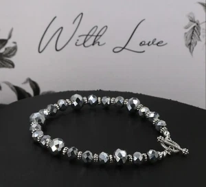 Silver sparkly glass crystal bracelet, Tibetan silver spacers + toggle - Picture 1 of 4