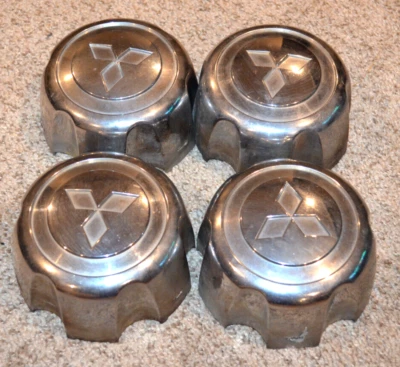 1998 1999 MITSUBISHI MONTERO CENTER CAPS WHEEL CENTERS HUB CAPS AUTHENTIC SET Foto 1 de 4