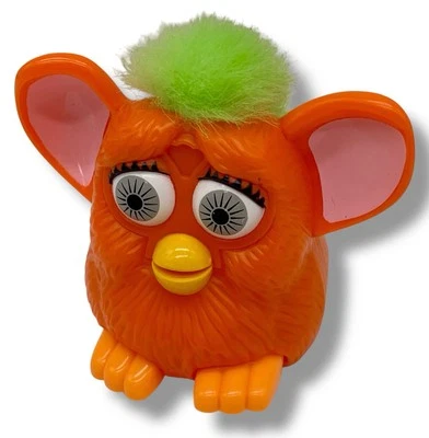 "Juguete Happy Meal McDonalds de plástico naranja y verde Furby 1998 vintage 3"" con ruedas" Foto 1 de 4