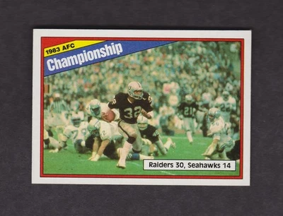 1984 Topps Football Card #7 AFC Championship Oakland Raiders NMMT Marcus Allen - Image 1 of 2