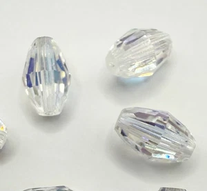 10 Genuine 5200 Swarovski Olive/Barrel Shape Faceted Beads in Crystal AB effect - Picture 1 of 4