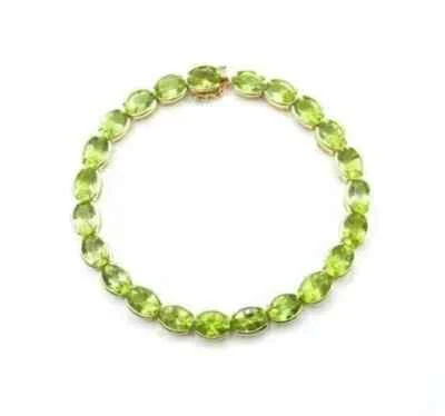 8CT Oval Cut Lab-Created Peridot Women'sTennis Bracelet 14KYell Gold Plated 7.5" - Image 1 of 4