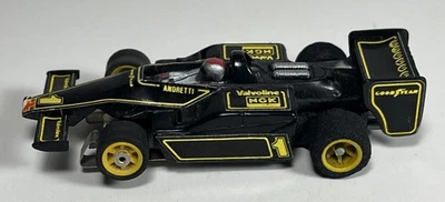 Aurora AFX Indy F1 Ford Lotus Valvoline NGK Negro #1 Andretti HO Slot Car Funciona Foto 1 de 4
