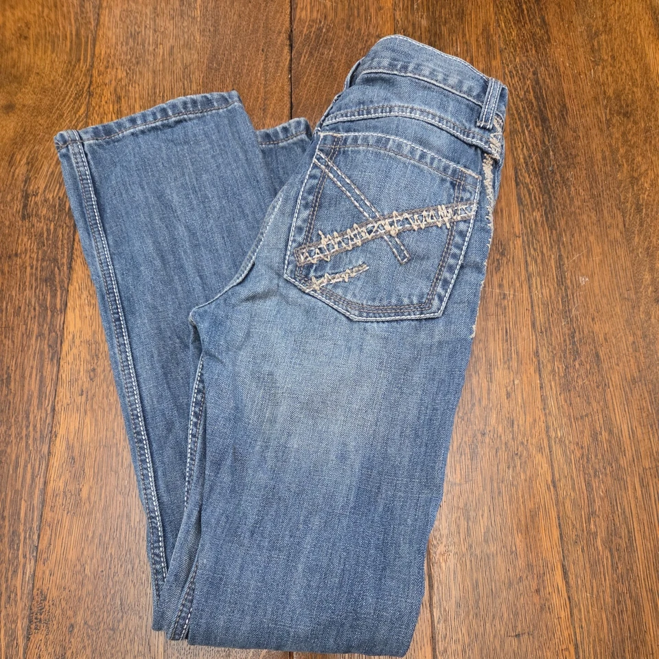 Pantalones de mezclilla vaqueros ajustados Wrangler 20x para niños talla 16 bonitas costuras excelente estado  Foto 1 de 4