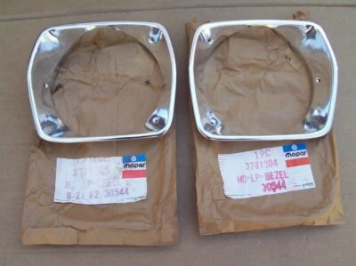 1975 1976 Plymouth NOS Mopar HEAD LAMP BEZEL PAIR Duster Valiant Scamp - Image 1 of 4
