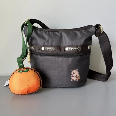 Lesportsac Capybara Crossbody Bucket Bag with Orange Charm NWT - Image 1 of 4