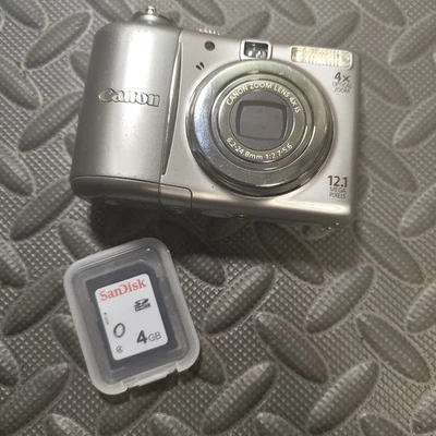 Canon PowerShot A1100 IS Camera 10MP Digital Purple 4X Zoom Image Stabilizer - Image 1 of 4