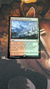 MTG Wooded Foothills GERMAN Foothills Wooded Rare Fetch Land - Picture 1 of 2