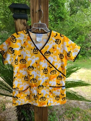 UA SCRUBS HALLOWEEN PRINT SCRUB TOP SIZE SMALL YELLOW MULTI COLOR EXC. COND - Image 1 of 4