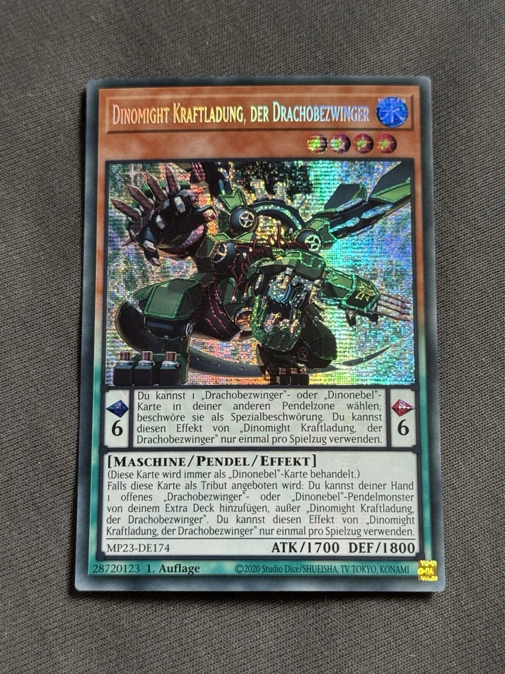 Yu-Gi-Oh! Dinomight Kraftladung, der Drachobezwinger -  MP23-DE024 - Secret - A2 - Bild 1 von 1
