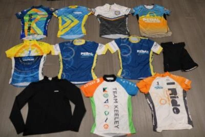 LOTE 11 CAMISETAS DE CICLISMO PRIMAL PARA MUJER PANTALONES CORTOS ROPA AK PERLA IZUMI S M L XL Foto 1 de 4