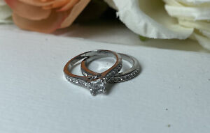 Size 10 elegant and exquisite silver plated zircon gem engagement/bridal set.