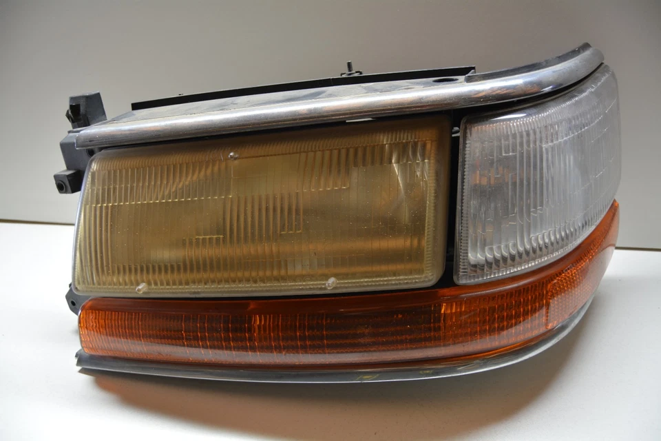 91-95 PLYMOUTH VOYAGER LUZ DE CABEZA DEL LADO DEL CONDUCTOR IZQUIERDO CON INTERMITENTE OEM, 114-00201 Foto 1 de 4