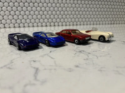 NEW 4 Vintage Matchbox Lesney Jaguar Cars XK-120 / XJ6 / XJ220 - Image 1 of 4