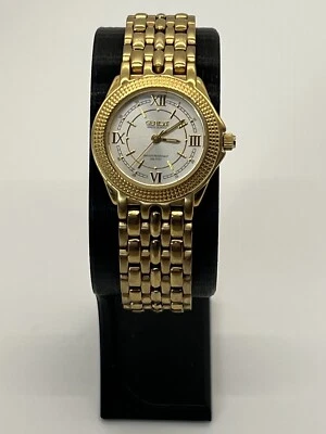 Винтажные швейцарские часы Geneve с рифленым безелем золотистый новый аккумулятор работает хорошо. (B3) - Изображение 1 из 4