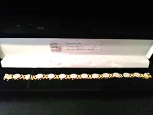 HUGS  & KISSES GENUINE DIAMOND FLEX BANGLE TENNIS BRACELET SZ 7-7.5 IN + BONUS! - Picture 1 of 1