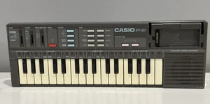Teclado electrónico sintetizador de música vintage CASIO PT-87 solo piezas sin ROM - Imagen 1 de 7