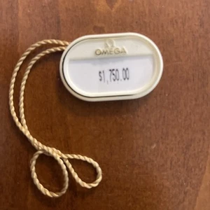 Reloj Omega vintage etiqueta colgante de plástico. (E) - Imagen 1 de 2