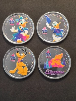 Disney Disneyland 70th Anniversary Colored Coins Set Of 4 Medallions Colorized - Image 1 of 2
