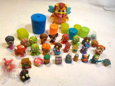 Trash Pack Figures ans Moose Toys Trashies Grossery Gang toy lot Cover