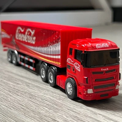 Camion container scala 1:64 Scania varie grafiche - Immagine 1 di 4