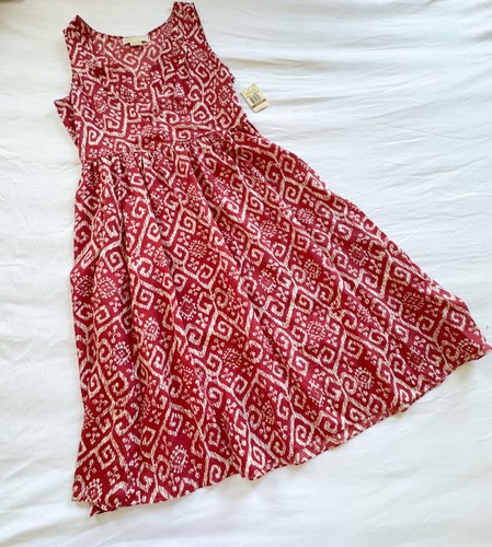 Abito MICHAEL KORS rosso stampa seta senza maniche plissettato incrociato davanti nuovo con etichette taglia 12