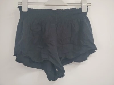 Pantalones cortos negros lisos de cintura elástica de mezcla de algodón Brandy Melville para mujer talla única Foto 1 de 4