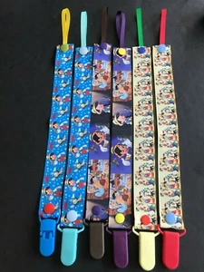 Handgefertigter Schnullerhalter - Disney - Pinocchio, Emperors New Groove, Big Hero 6 - Bild 1 von 36